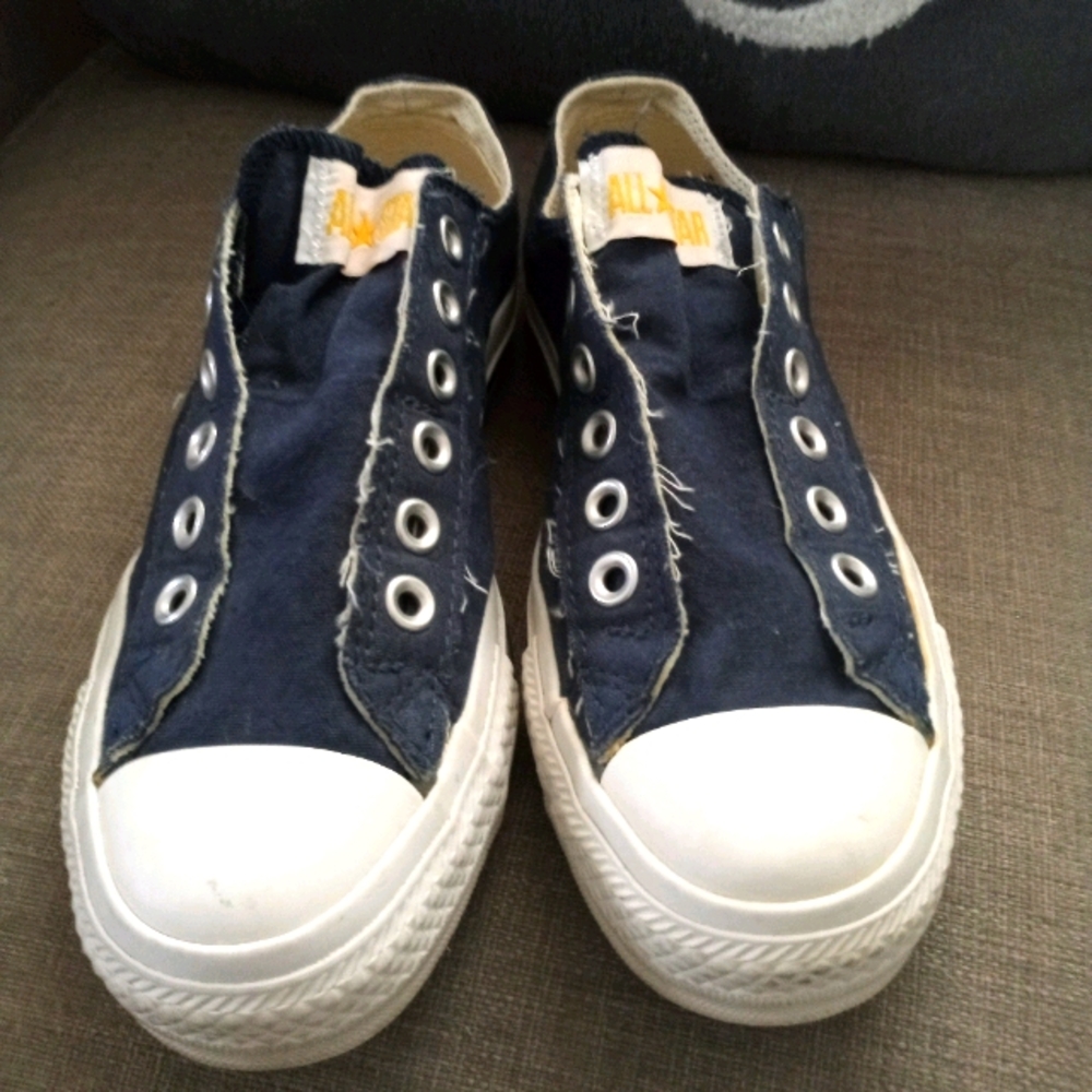 Chuck Taylor Converse low slip ons